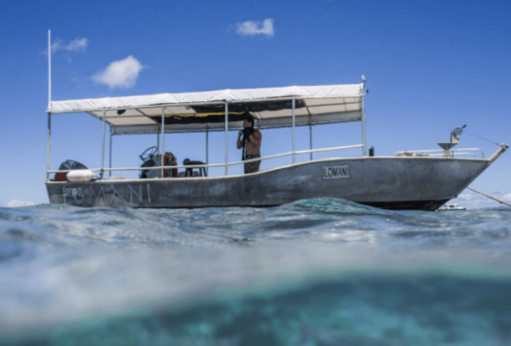 Lomani Island dive boat on the water.