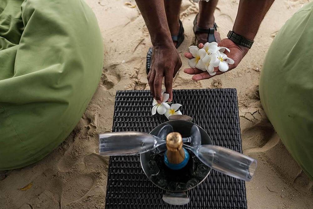 Sunset serenader set up on the beach at lomani island Resort